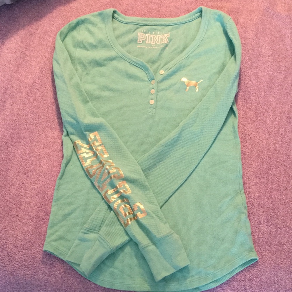 Pink long sleeve shirt.